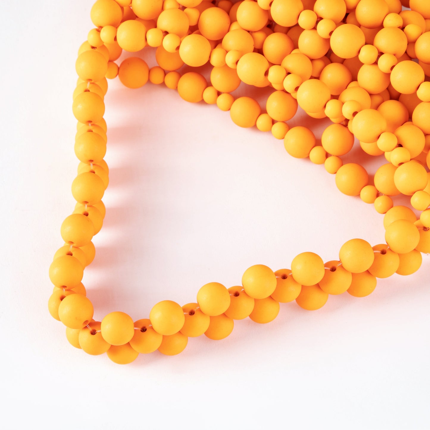 Rubber Orange Bead Pouch