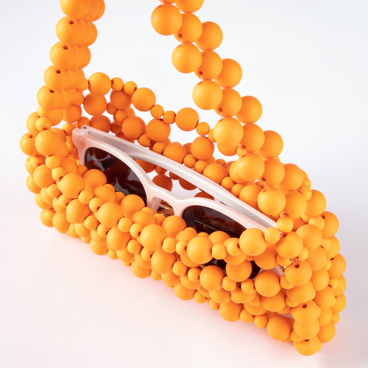 Rubber Orange Bead Pouch